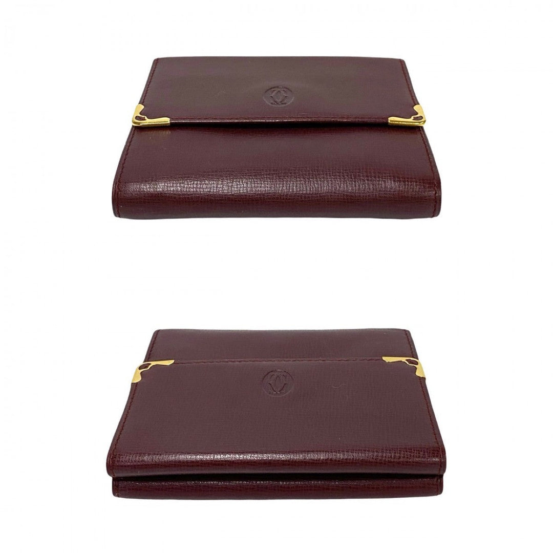CARTIER Tri-fold wallet leather wine-red Must Line