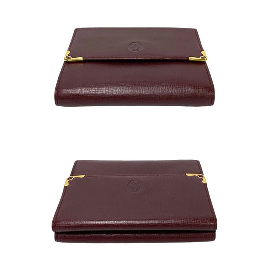 CARTIER Tri-fold wallet leather wine-red Must Line