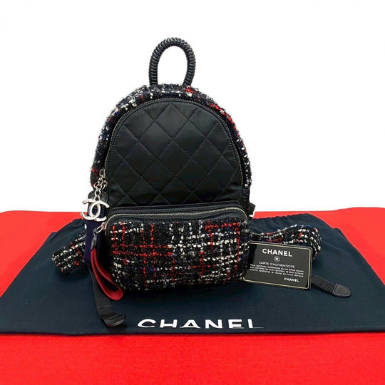 CHANEL Backpack tweed black