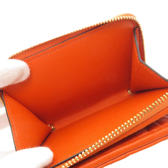 VERSACE Bifold Wallet Calfskin Orange logoMetal Women Used Authentic