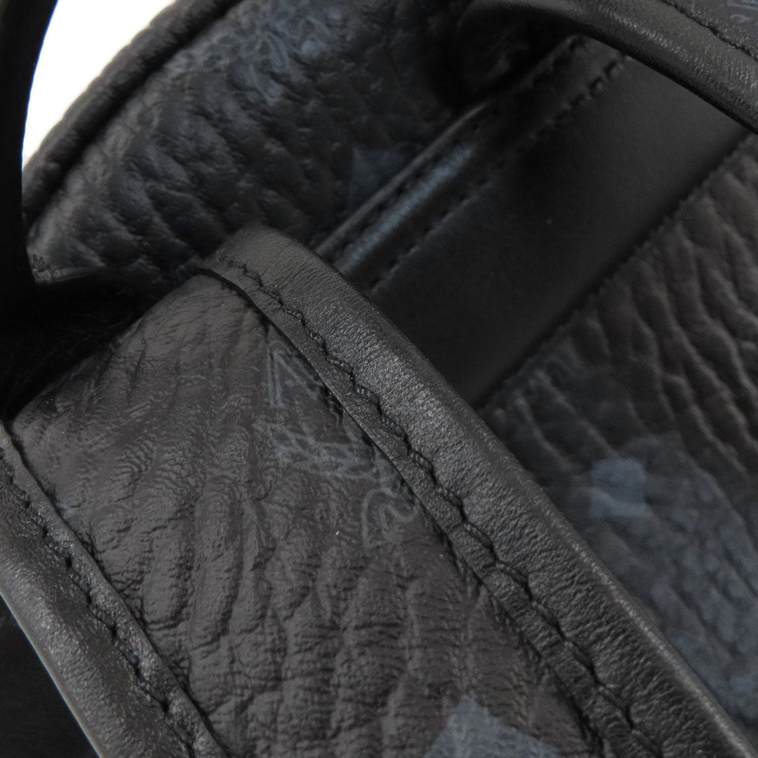 MCM Backpack PVC black logo Women Used Authentic