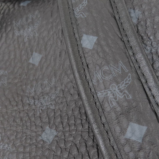 MCM Backpack PVC black logo Women Used Authentic