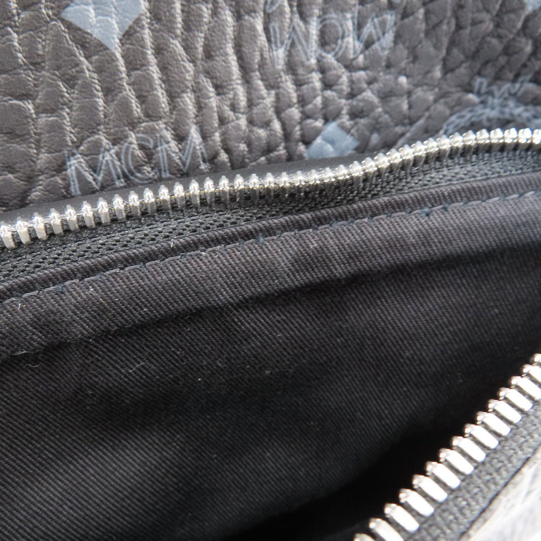 MCM Backpack PVC black logo Women Used Authentic