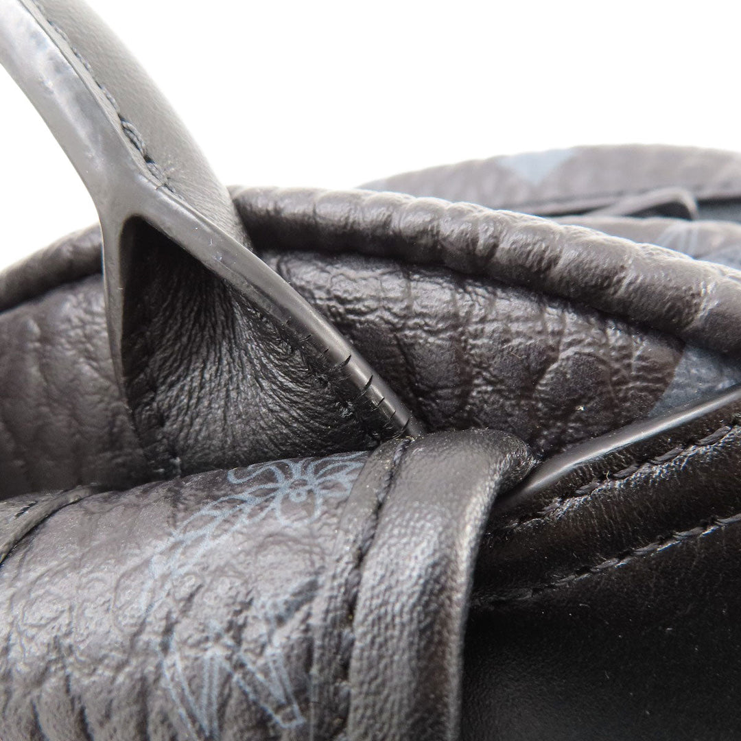 MCM Backpack PVC black logo Women Used Authentic