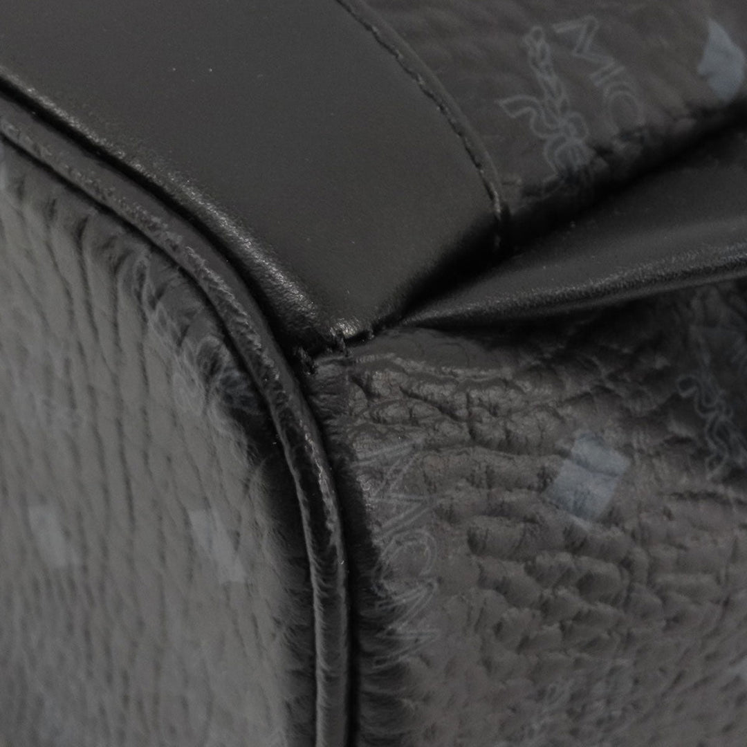 MCM Backpack PVC black logo Women Used Authentic