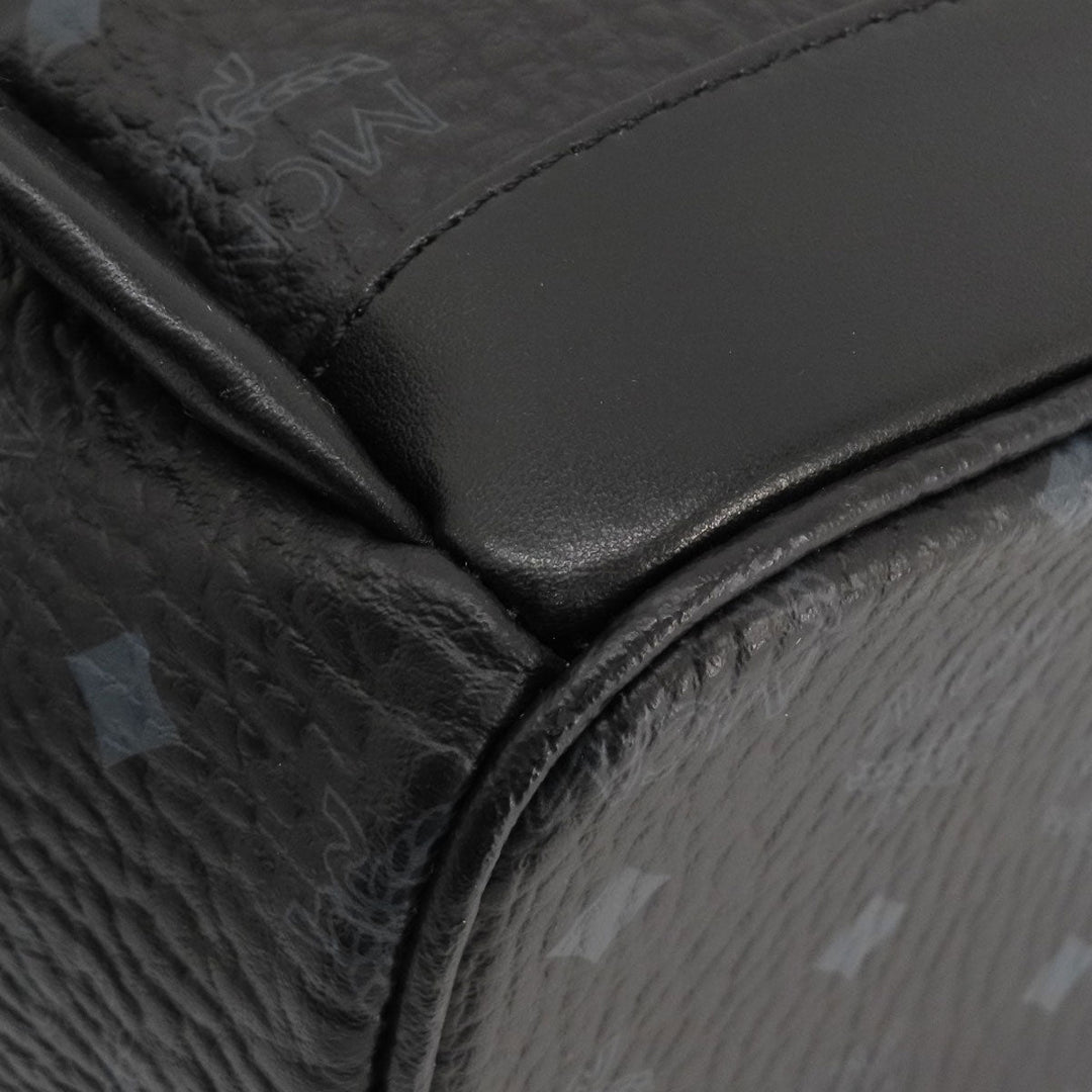 MCM Backpack PVC black logo Women Used Authentic