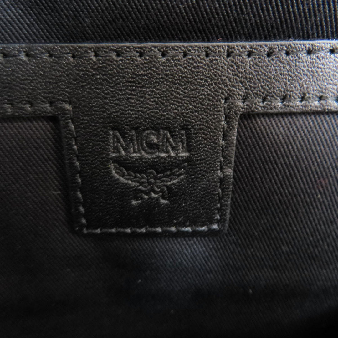 MCM Backpack PVC black logo Women Used Authentic