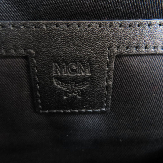 MCM Backpack PVC black logo Women Used Authentic