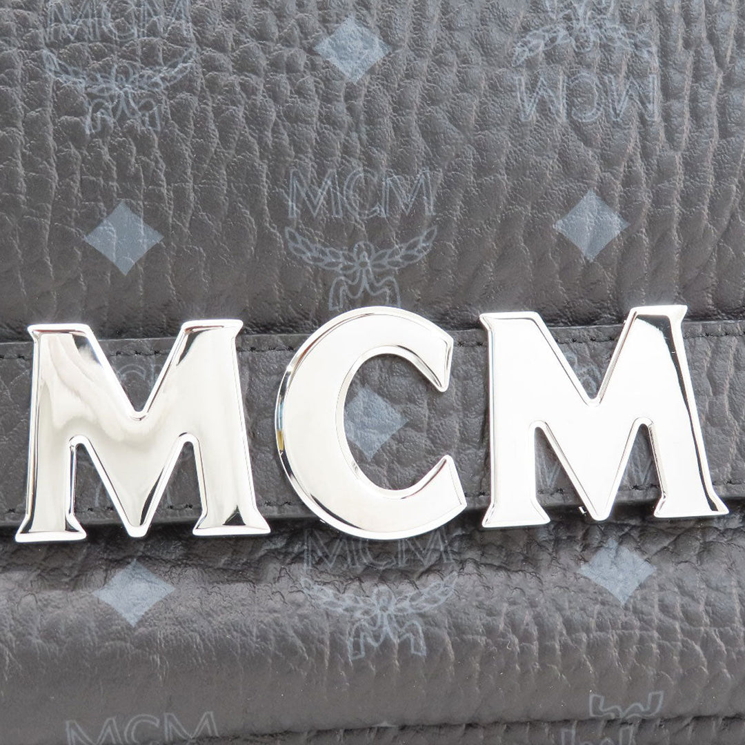 MCM Backpack PVC black logo Women Used Authentic