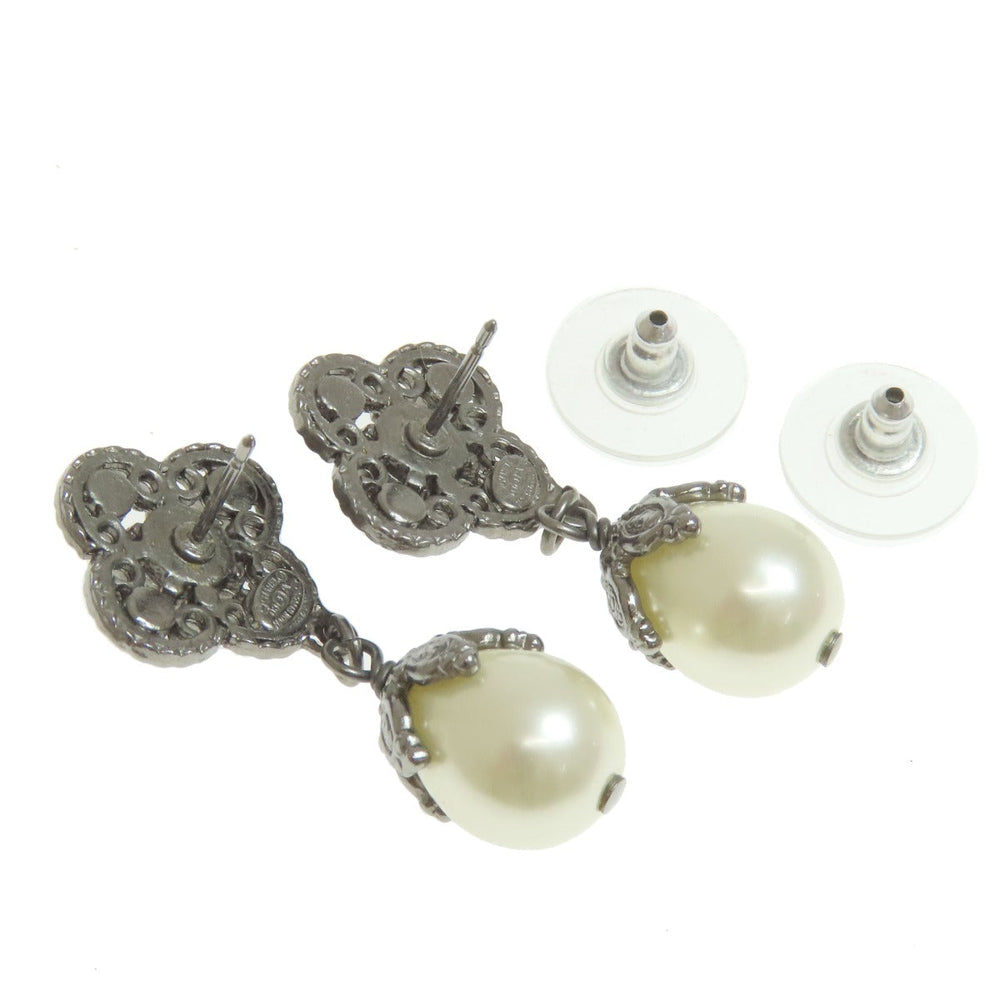 CHANEL Pierce metallic Silver COCO Mark Women Used Authentic