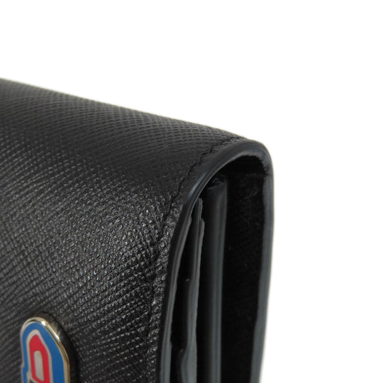 PRADA Long Wallet Purse 1MH132 leather black Saffiano pin badge Women Used Authentic