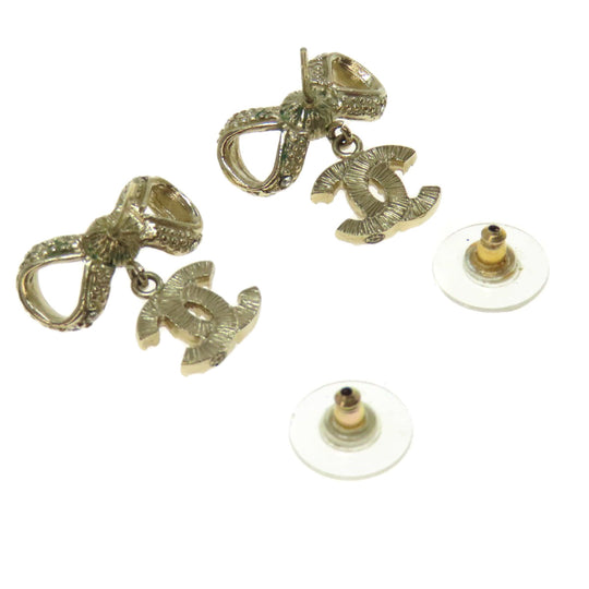 CHANEL Pierce metallic gold COCO Mark Ribbon Women Used Authentic