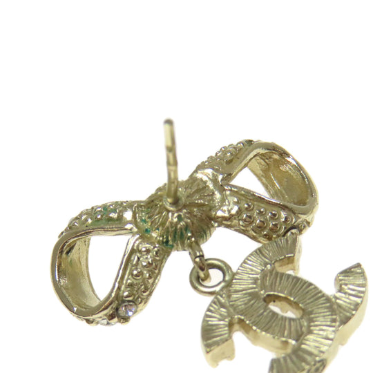 CHANEL Pierce metallic gold COCO Mark Ribbon Women Used Authentic