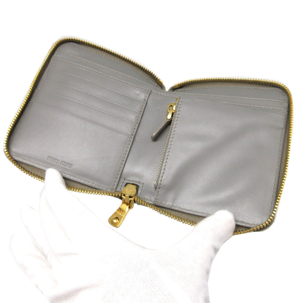 MIUMIU Bifold Wallet Embossed leather gray Compact wallet Zip Around Women Used Authentic