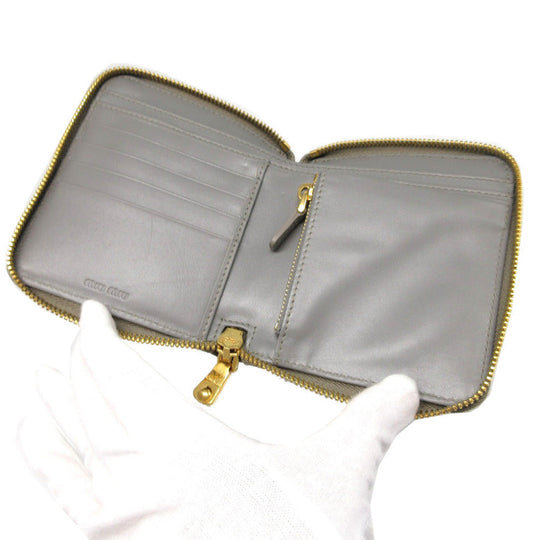MIUMIU Bifold Wallet Embossed leather gray Compact wallet Zip Around Women Used Authentic