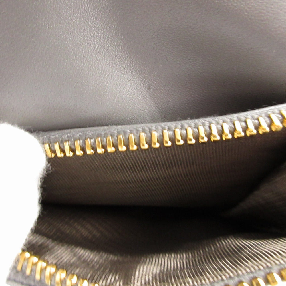 MIUMIU Bifold Wallet Embossed leather gray Compact wallet Zip Around Women Used Authentic