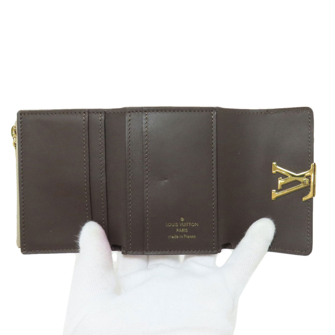 LOUIS VUITTON Bifold Wallet M68747 Taurillon Clemence beige Portefeuille Capucines XS