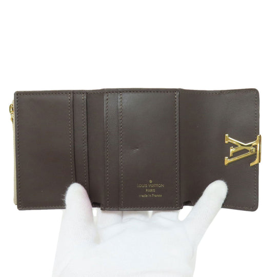 LOUIS VUITTON Bifold Wallet M68747 Taurillon Clemence beige Portefeuille Capucines XS