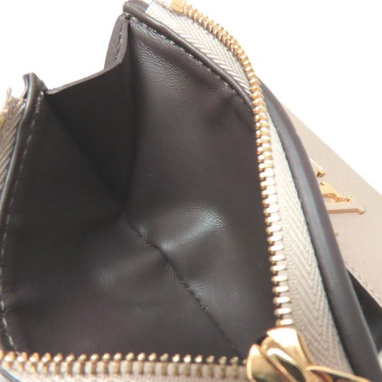 LOUIS VUITTON Bifold Wallet M68747 Taurillon Clemence beige Portefeuille Capucines XS