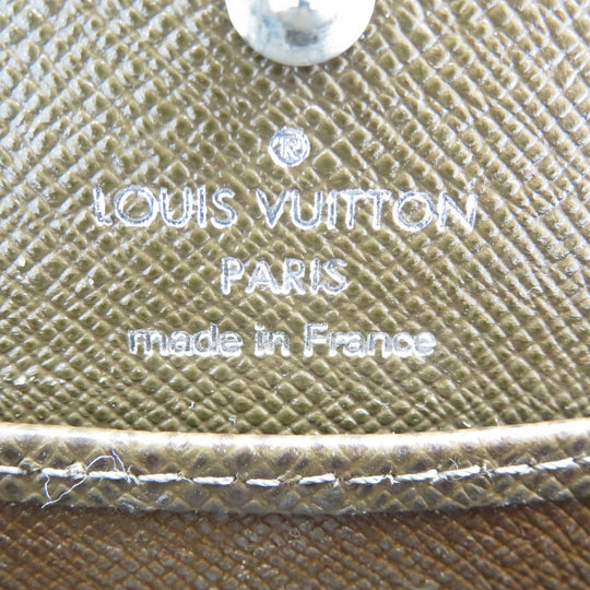 LOUIS VUITTON Coin case M30388 Taiga Grizzly Taiga Porto Monnet Bowat mens Used Authentic