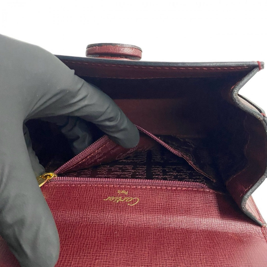 CARTIER Handbag leather wine-red Must Line