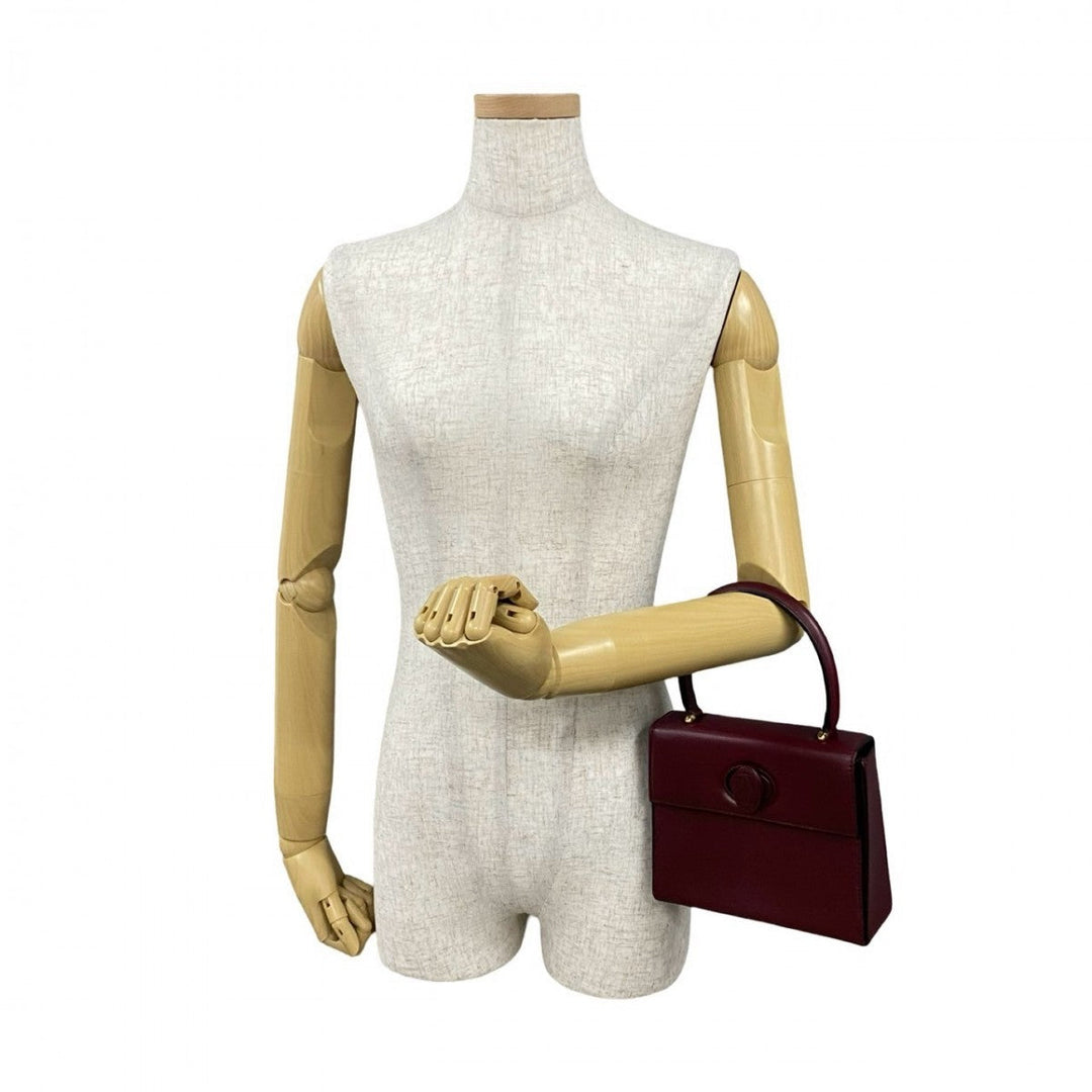 CARTIER Handbag leather wine-red Must Line