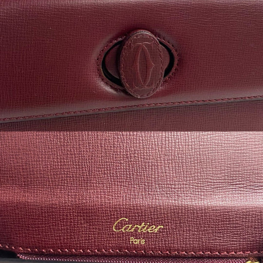 CARTIER Handbag leather wine-red Must Line