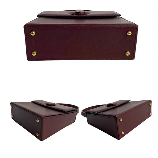 CARTIER Handbag leather wine-red Must Line
