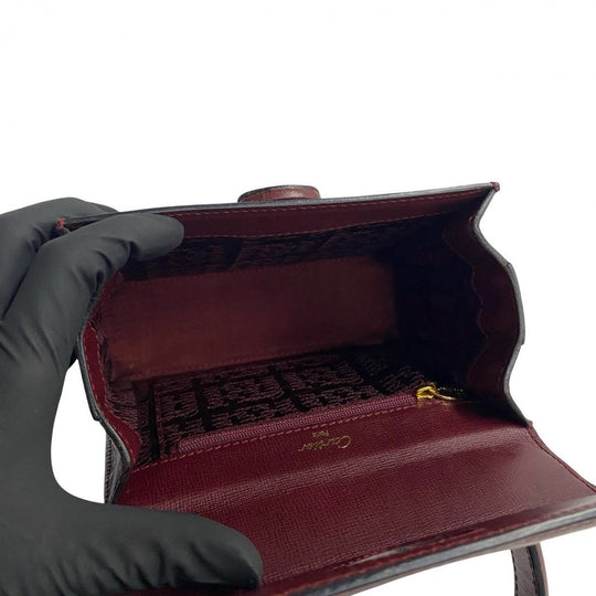 CARTIER Handbag leather wine-red Must Line