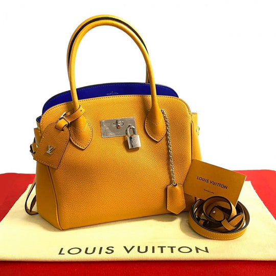 LOUIS VUITTON Shoulder Bag leather Orange Mira PM