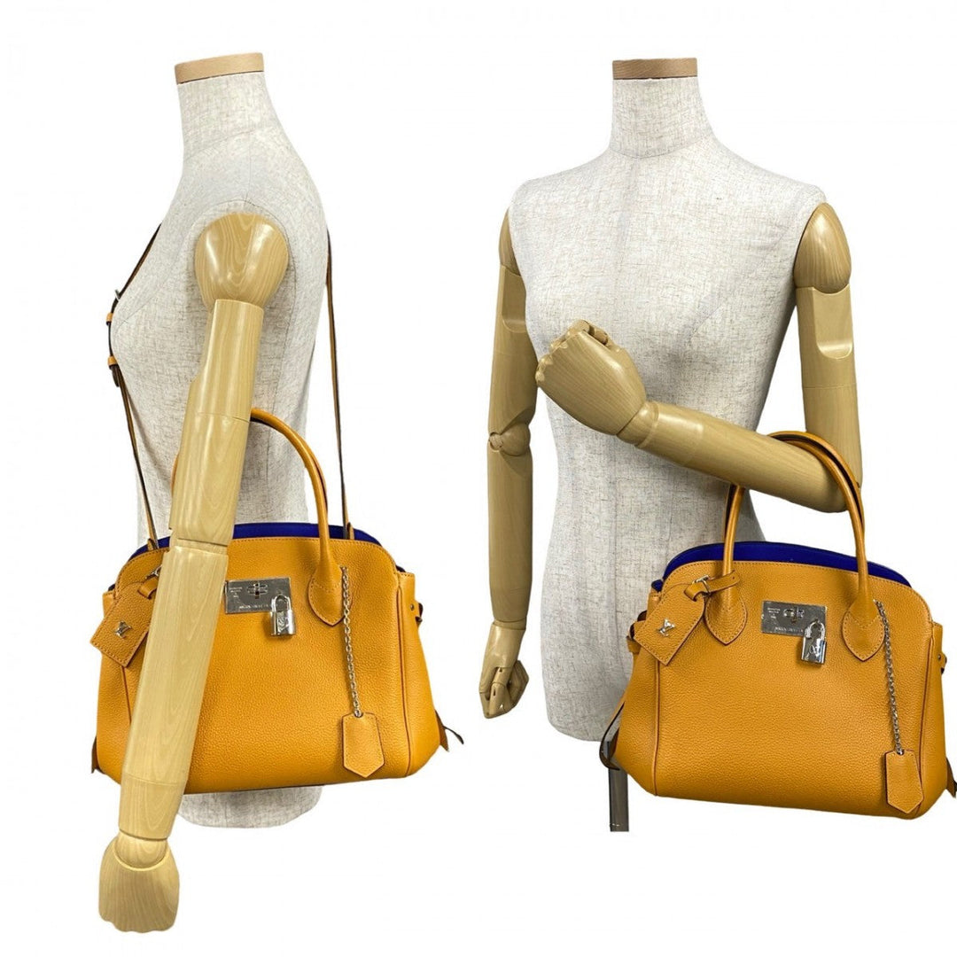 LOUIS VUITTON Shoulder Bag leather Orange Mira PM