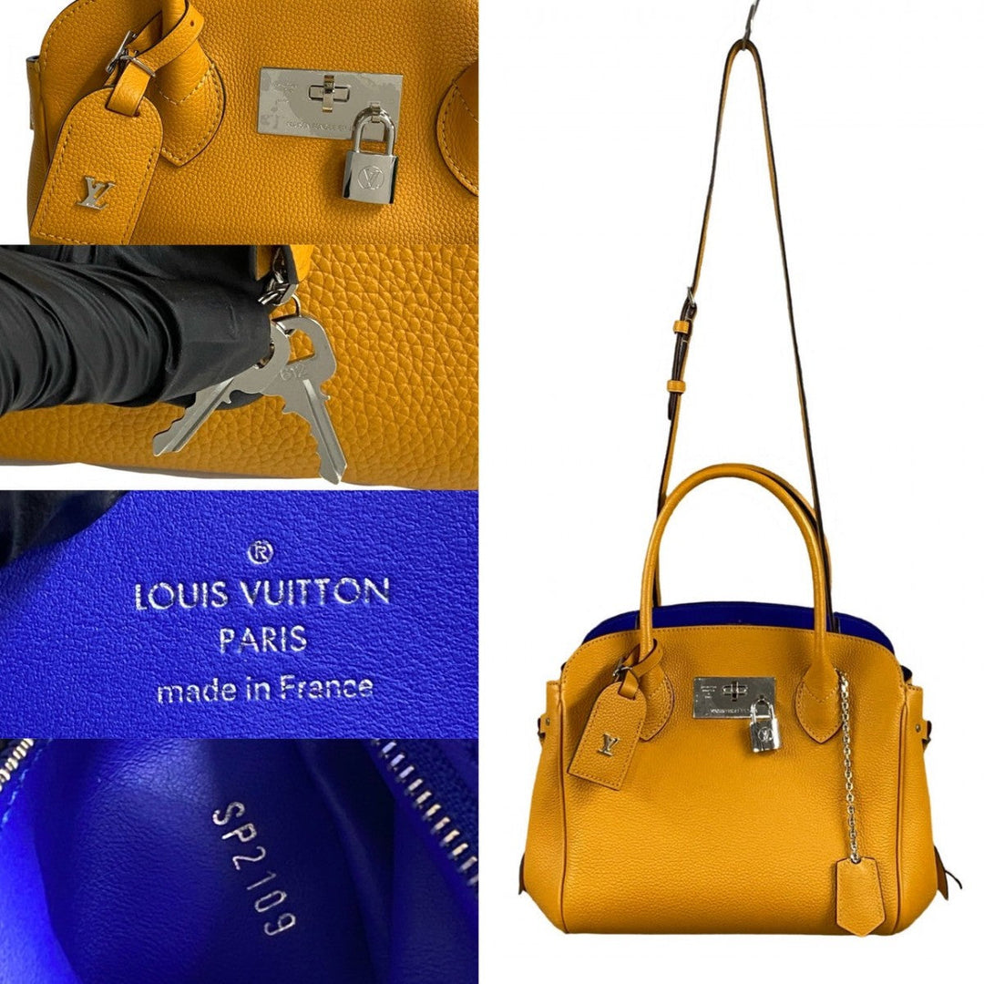 LOUIS VUITTON Shoulder Bag leather Orange Mira PM