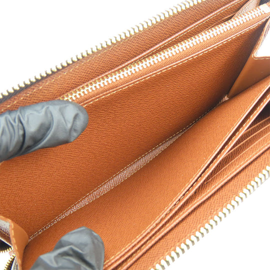 LOUIS VUITTON Long Wallet Purse M42616 Monogram Brown Zippy wallet unisex(Unisex) Used Authentic