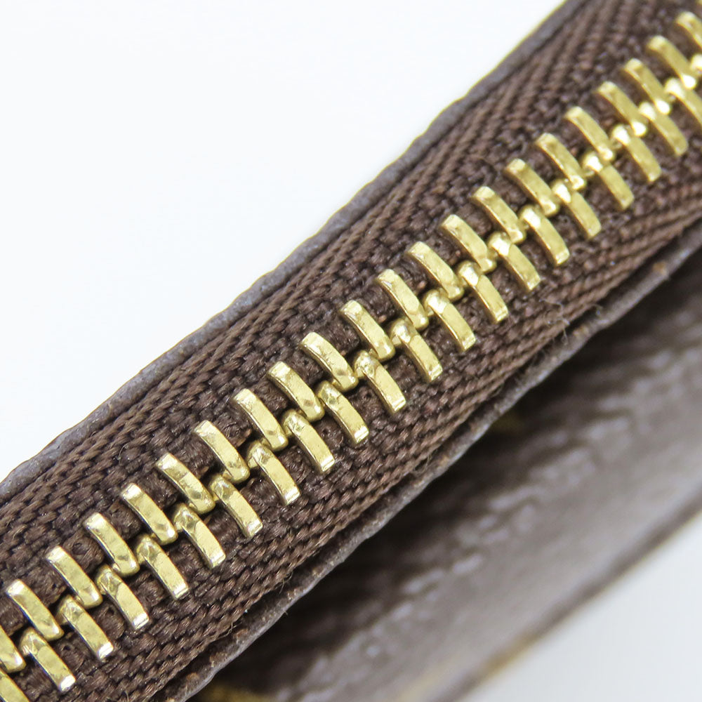 LOUIS VUITTON Coin case M60025 Monogram Brown portomone shilling Women(Unisex) Used Authentic