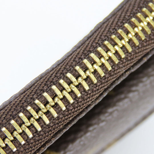 LOUIS VUITTON Coin case M60025 Monogram Brown portomone shilling Women(Unisex) Used Authentic