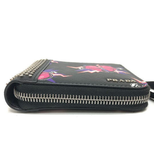 PRADA Folded wallet 2ML221 saffiano leather Black x pink Studs with strap and key ring Frankenheart Women Secondhand Authentic