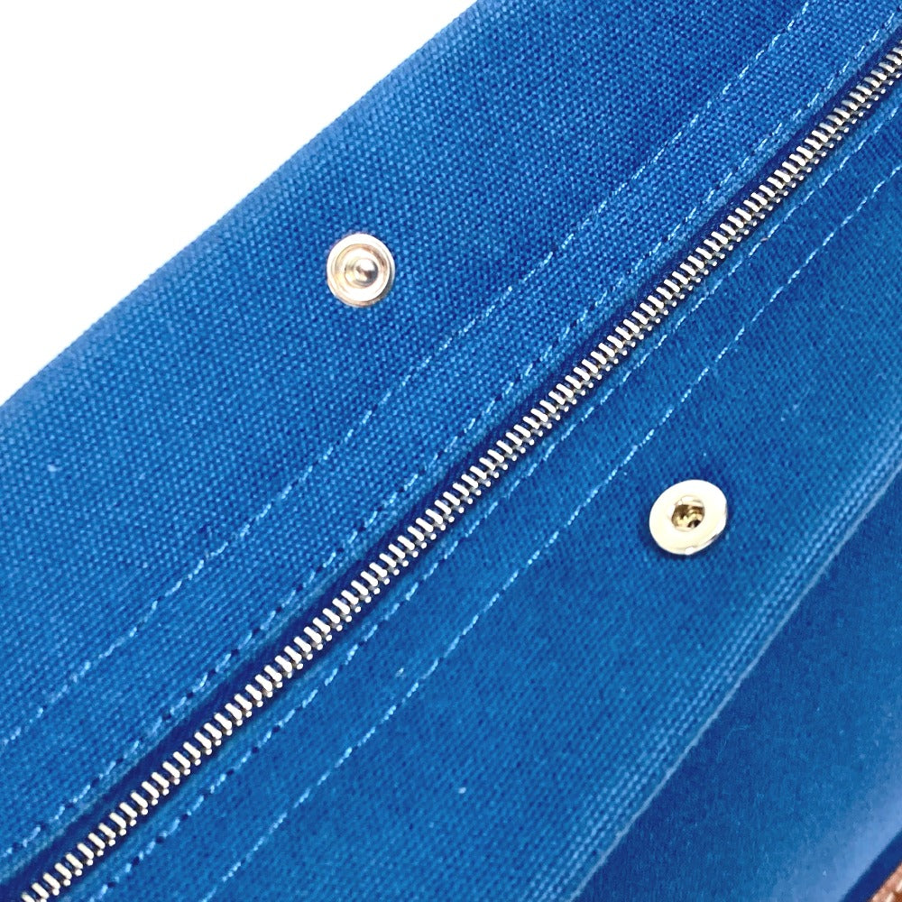 HERMES Clutch bag Canvas / leather Navy Embroidery logo Camille mens Used Authentic