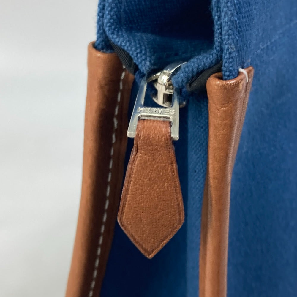 HERMES Clutch bag Canvas / leather Navy Embroidery logo Camille mens Used Authentic