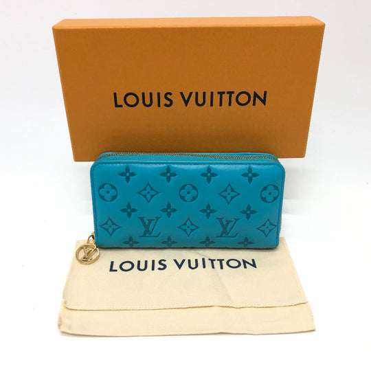 LOUIS VUITTON Long Wallet Purse M81512 leather blue Monogram emboss Zippy wallet unisex(Unisex) Used Authentic