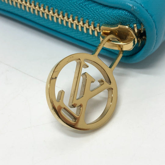 LOUIS VUITTON Long Wallet Purse M81512 leather blue Monogram emboss Zippy wallet unisex(Unisex) Used Authentic