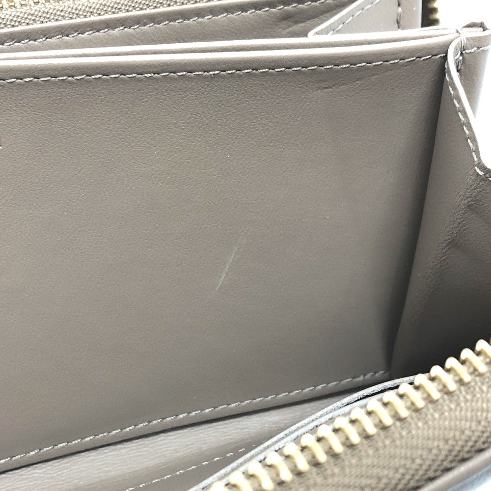 LOUIS VUITTON Long Wallet Purse M81511 leather Beige type Monogram emboss Zippy wallet