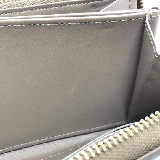 LOUIS VUITTON Long Wallet Purse M81511 leather Beige type Monogram emboss Zippy wallet