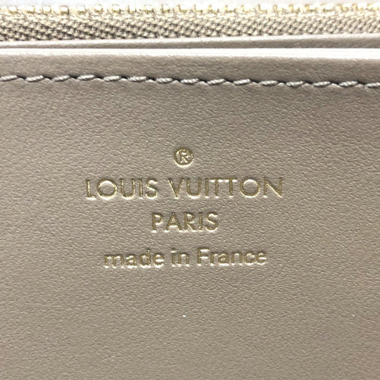 LOUIS VUITTON Long Wallet Purse M81511 leather Beige type Monogram emboss Zippy wallet