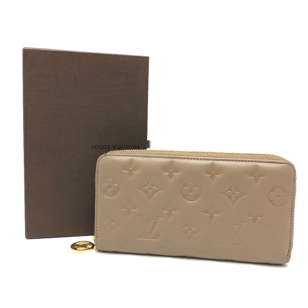 LOUIS VUITTON Long Wallet Purse M81511 leather Beige type Monogram emboss Zippy wallet