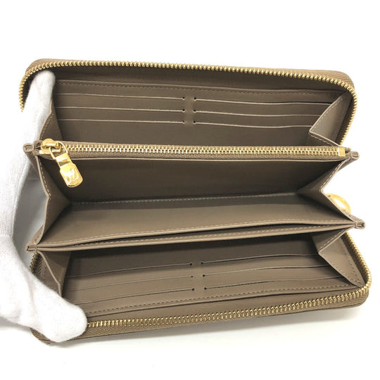 LOUIS VUITTON Long Wallet Purse M81511 leather Beige type Monogram emboss Zippy wallet