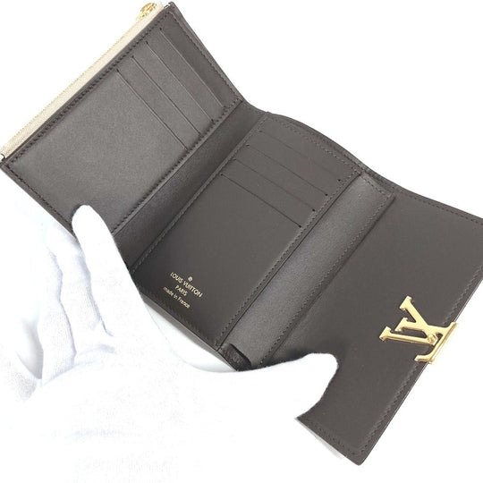 LOUIS VUITTON Trifold wallet M62159 Taurillon Clemence Leather beige Portefeuille Compact Women Used Authentic