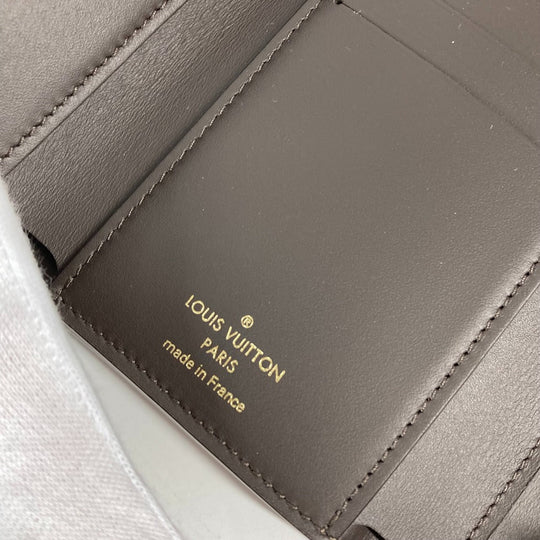 LOUIS VUITTON Trifold wallet M62159 Taurillon Clemence Leather beige Portefeuille Compact Women Used Authentic