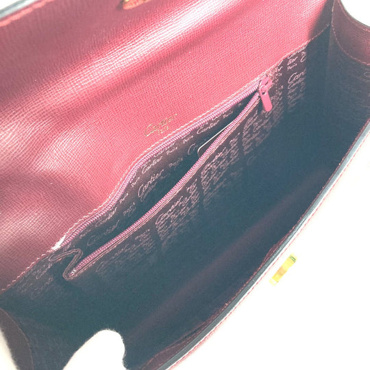 CARTIER Clutch bag leather wine-red Must Line With strap and flap mens Used Authentic