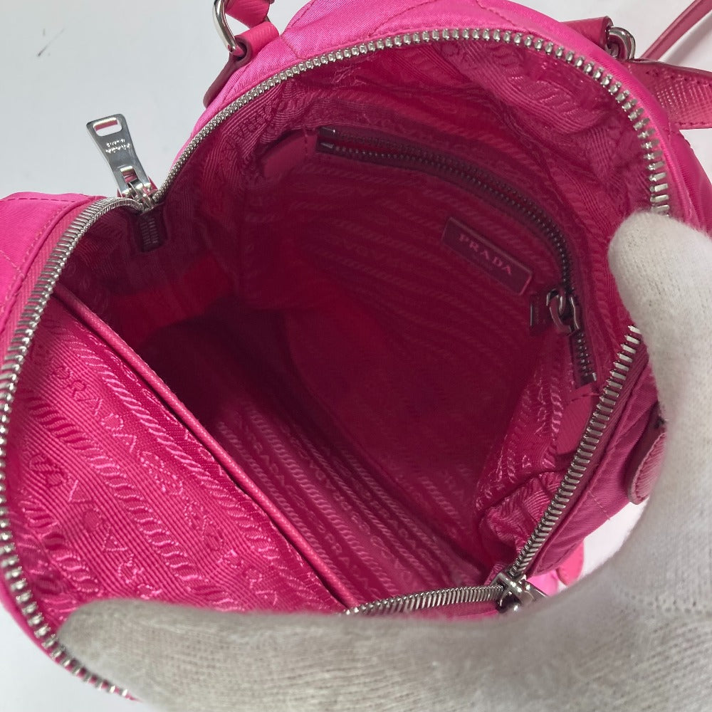 PRADA Backpack 1BZ066 Nylon, Saffiano Leather pink Triangle logo plate Quilted backpack Women Used Authentic