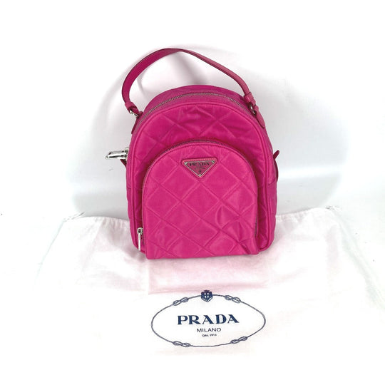 PRADA Backpack 1BZ066 Nylon, Saffiano Leather pink Triangle logo plate Quilted backpack Women Used Authentic
